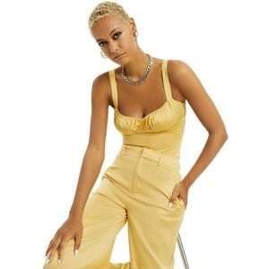 Danielle Bernstein yellow satin like bodysuit nwt! 10